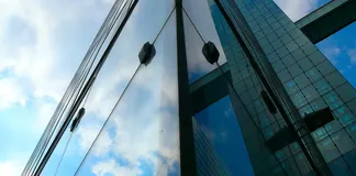 Photo of geometric shapes in front of office buildings.